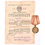 A WWII Soviet Russian medal for the Defence of Stalingrad, first type issued during the war, with