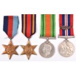 Four: 1939-45 star, Burma star, Defence, War medal with MID emblem (un-named as issued) with