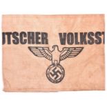 A Third Reich Volksturm armband, cream coloured fabric and printed in black with “Deutscher