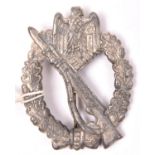 A Third Reich infantry assault badge, unusual die stamped alloy version. GC £40-60.