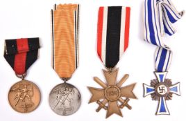 Third Reich medals: War Merit Cross 2nd class with swords, the ring stamped with number (11?); medal