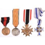 Third Reich medals: War Merit Cross 2nd class with swords, the ring stamped with number (11?); medal