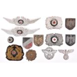 Third Reich insignia: two Luftwaffe NCO’s aluminium cap cockades; two Customs officer’s aluminium