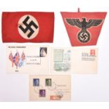 A Third Reich NSDAP member’s printed cloth armband; a small printed triangular flag with black on