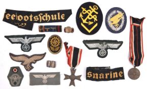 Third Reich medals and insignia: War Merit Cross 2nd class without swords (worn); War Merit medal; 2