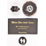 3 Third Reich SS items, enamelled WM ring in its box, enamelled lapel badge; a small mirror with