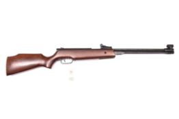 A .22” SMK XS 36-1 underlever air rifle, no visible serial number, with stained beech stock. GWO &