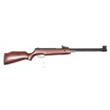 A .22” SMK XS 36-1 underlever air rifle, no visible serial number, with stained beech stock. GWO &