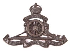 An officer’s cast bronze cap badge of the Warwickshire Royal Horse Artillery, GC (one prong missing,
