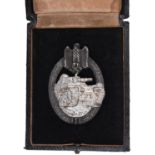 A Third Reich Tank Assault badge, grey metal with silvered tank, in case of issue. GC (case worn) £