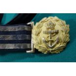 A good KC naval officer’s bullion and leather waist belt and sword slings, with gilt buckle, the
