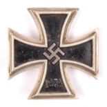 A Third Reich Iron Cross 1st Class, the underside of the flat pin stamped with the number “20”,