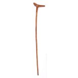 A Boer War period St Helena Prisoner of War carved walking stick, the slender haft carved “ST.