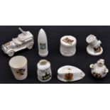8 Crested China Items comprising R.N.A.S. Anti Aircraft Lorry (Birmingham), Artillery Shell (
