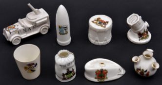 8 Crested China Items comprising R.N.A.S. Anti Aircraft Lorry (Birmingham), Artillery Shell (