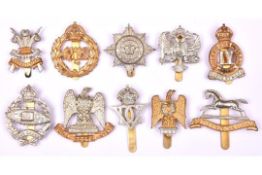 10 Mostly WWII period Cavalry cap badges: WM KDG, Bays, 3rd Carabiniers, 4/7th DG, Royal Dragoons (