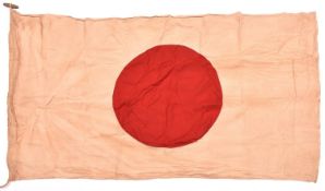 A Japanese flag, 60” x 32”, white cloth with applied red sun. GC £60-80.