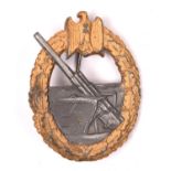 A Third Reich Coastal Artillery badge, with maker’s mark “FLL” in trefoil over “43” (Friedrich