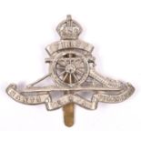 An OR’s white metal cap badge of the First Hants Royal Garrison Artillery Volunteers, with