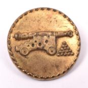 A Royal Artillery officer’s button, c 1790, bone back with 4 holes and gut threads, flat gilt