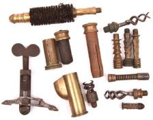 A small selection of antique gun tools etc: two .577” muzzle plugs with knurled brass ends; brass .