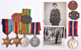 A husband and wife WWII group comprising: Four: 1939-45 Star, Africa star, Defence, War medals (un-