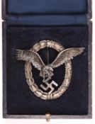 A Third Reich Luftwaffe Pilot’s silvered finish breast badge, in case of issue. VGC £280-300