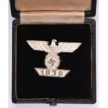 A Third Reich bar to the Iron Cross 1st class, in case of issue. VGC (case slightly worn) £50-70.