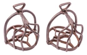 A pair of 17th century iron cage stirrups, 4 tubular iron strips to cage and well designed foot