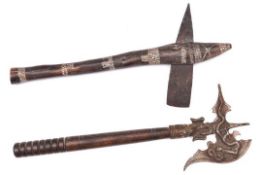An African agricultural axe, with flat iron blade and wooden haft decorated with bands of white