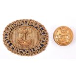 An officer’s oval bullion embroidered epaulette badge of the Royal Naval Artillery Volunteers, and a