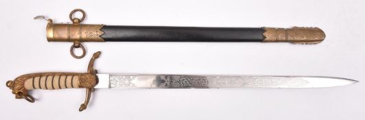 An 1891 pattern naval midshipman’s dirk, blade 17½” etched with panels of scrolled foliage,
