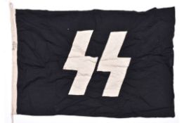 A Third Reich SS flag, 90cm x 57cm, black cloth with applique white runes, dated 1939. GC £250-300