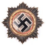 A scarce Third Reich German cross 1st class, pin marked “1”. GC £260-280.