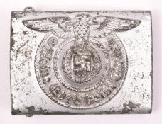 A Third Reich SS man’s belt buckle, plated steel. GC £60-80.