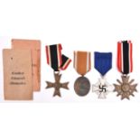 Third Reich medals: Faithful Service Decoration 2nd class; War Merit Cross 2nd class with swords,