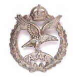 An officer’s silver cap badge of the Army Air Corps, HM B’ham 1942 and with J R Gaunt maker’s
