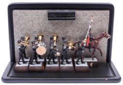 An Elastolin German Third Reich marching band set of 9 figures including Standard bearer and with