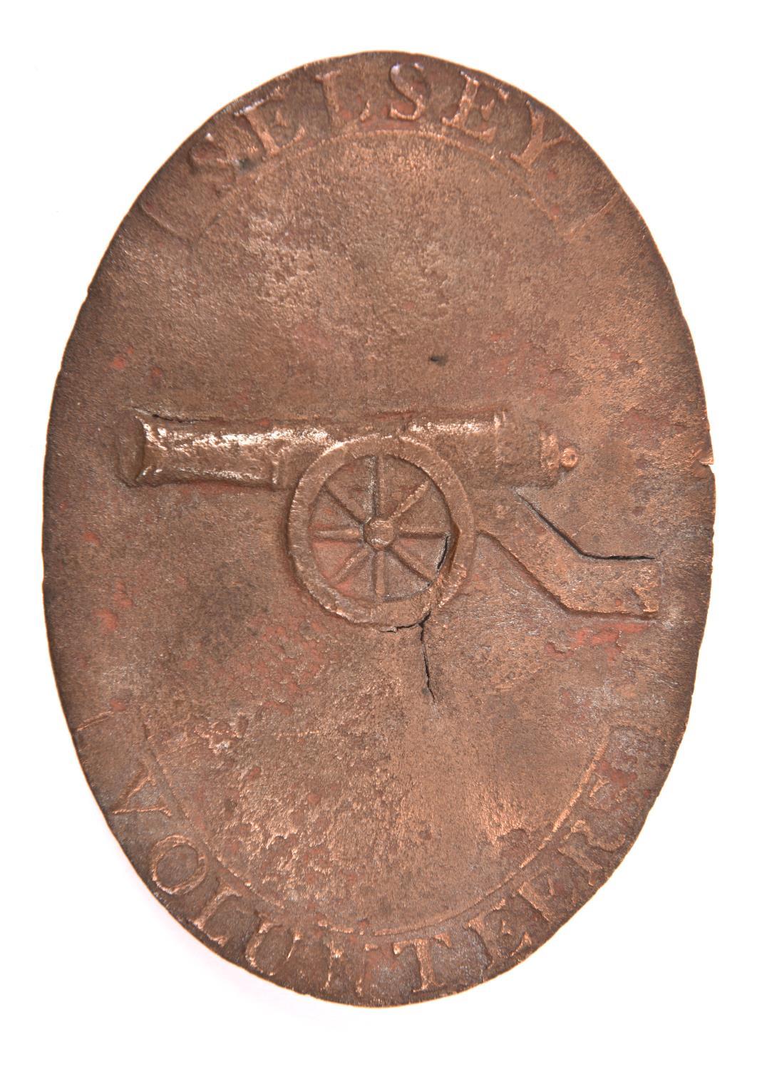 A rare die-struck oval brass shoulder belt plate of the Selsey Artillery Volunteers, c 1800, in