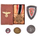 Third Reich War Service cross with swords, in case of issue; enamelled party badge; Hitlers Dank