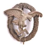 A Third Reich Observer’s breast badge, plated eagle and swastika. GC £50-70.