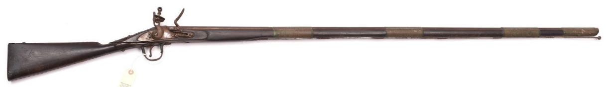A 24 bore flintlock trade gun, 67½” overall, barrel 51”, the octagonal breech with B’ham black
