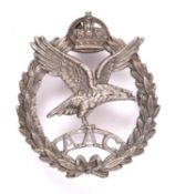 An officer’s silver cap badge of the Army Air Corps, HM B’ham 1942, with J R Gaunt maker’s mark