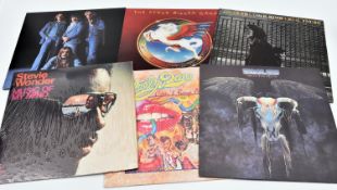 30x 12" vinyl records of mainly 1960s/70s/80s mainstream rock and pop including: Ike & Tina