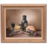 Brian Davies (1942 - 2014), oil painting on canvas. A still life with wine, bread and cheese. Signed