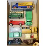 10 Dinky Toys. Leyland Comet Stake Truck in dark blue and yellow, with red wheels. Plus a Bedford