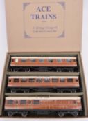 An Ace Trains O gauge LNER C/4 Set B 3 coach set in teak livery. Full First, Full Third and Brake