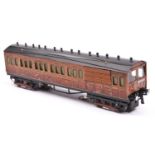 A Hornby O gauge Metropolitan Railway Bo-Bo electric driving car, in wood livery for 3 rail running.