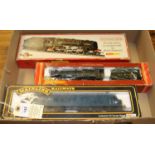 4x OO gauge locomotives by various makes. 2x Mainline; a BR Class 4 4-6-0 loco, 75006, in lined