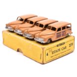 A Dinky Toy 4-vehicle Trade Box (27F). Containing 4 Estate Cars. In light brown with dark brown to